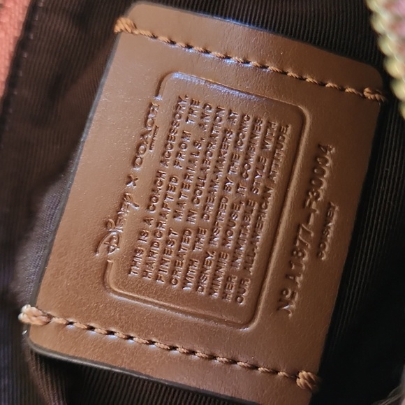 NWOT Disney X Coach Rollerblading Minnie Mouse Salmon Pink Wristlet ๐ ๐ผ๐ญ - Picture 11 of 14